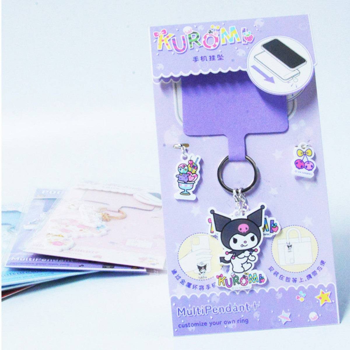 Kuromi Sanrio Characters Phone Strap Keychain displayed in packaging. A stylish and durable phone charm for customization and security.