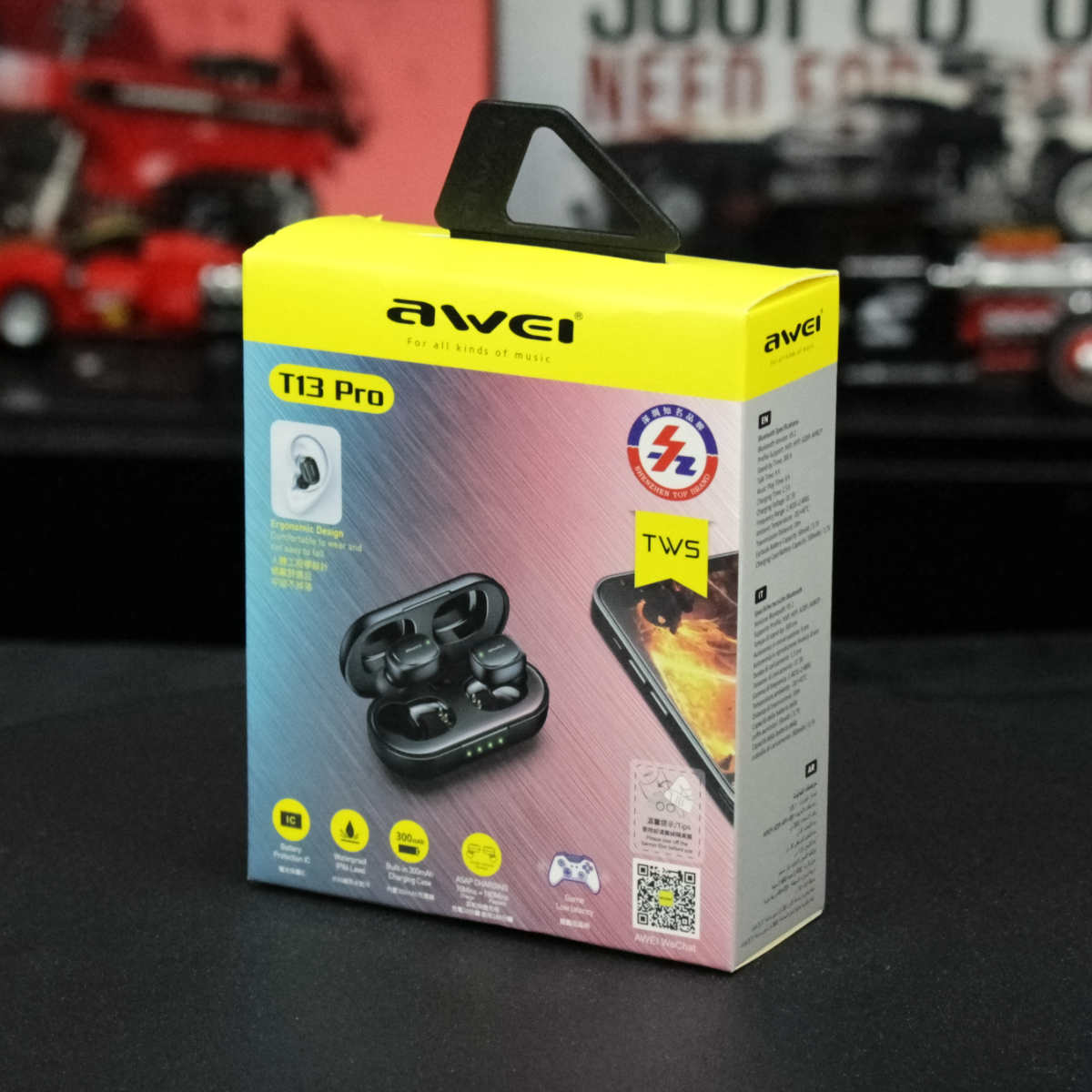 AWEI T13 Pro Earbuds retail packaging. Showcases product features, gaming compatibility, and immersive audio experience.