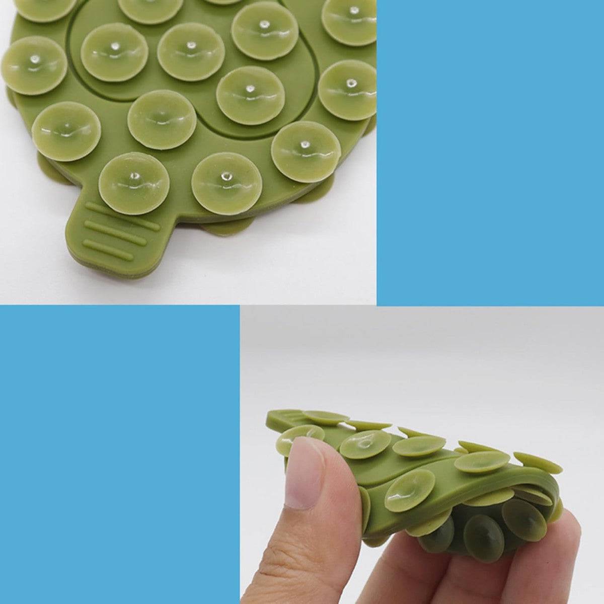 Green heart-shaped silicone suction cup phone holder with flexible and durable design for hands-free phone mounting.