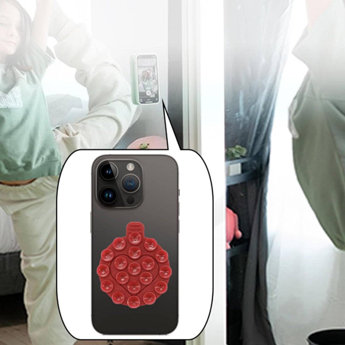 Red heart-shaped silicone suction cup phone holder attached to a smartphone, demonstrating strong adhesion on smooth surfaces.