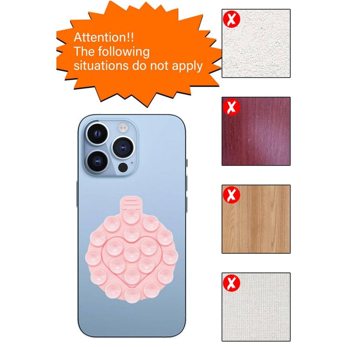 Warning image showing surfaces where the silicone suction cup phone holder does not adhere, including textured and wooden surfaces.