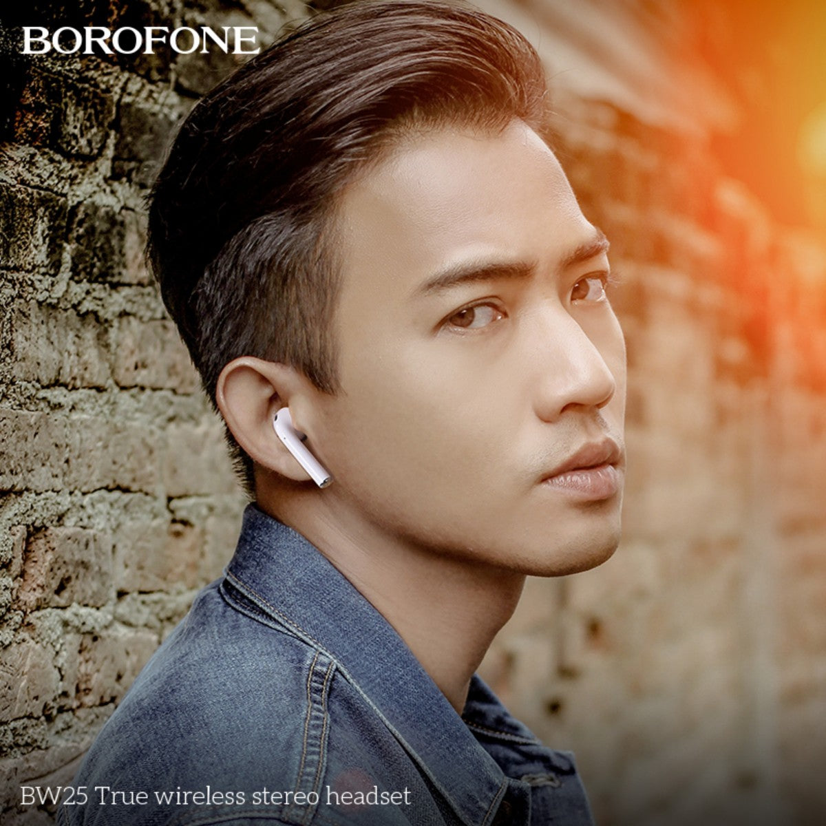Man wearing BOROFONE BW25 True Wireless Stereo Headset White outdoors, showcasing stylish and comfortable fit for everyday use.