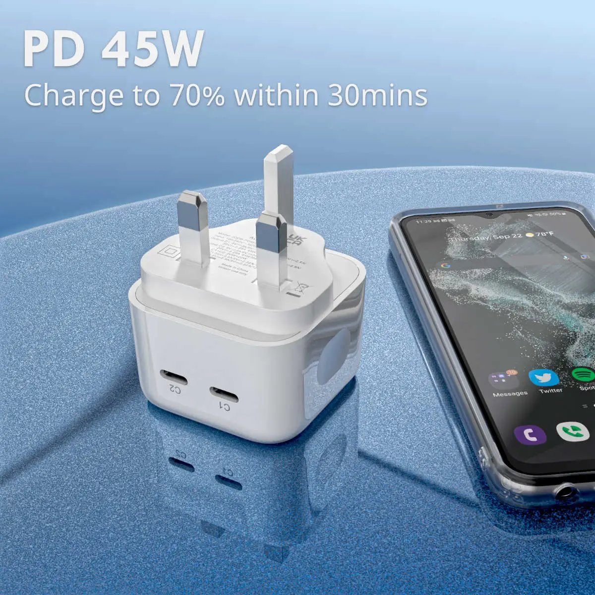 Hugmie PD 45W Fast Charger charging a smartphone, achieving 70% battery in 30 minutes. Dual USB-C ports for efficient power delivery.