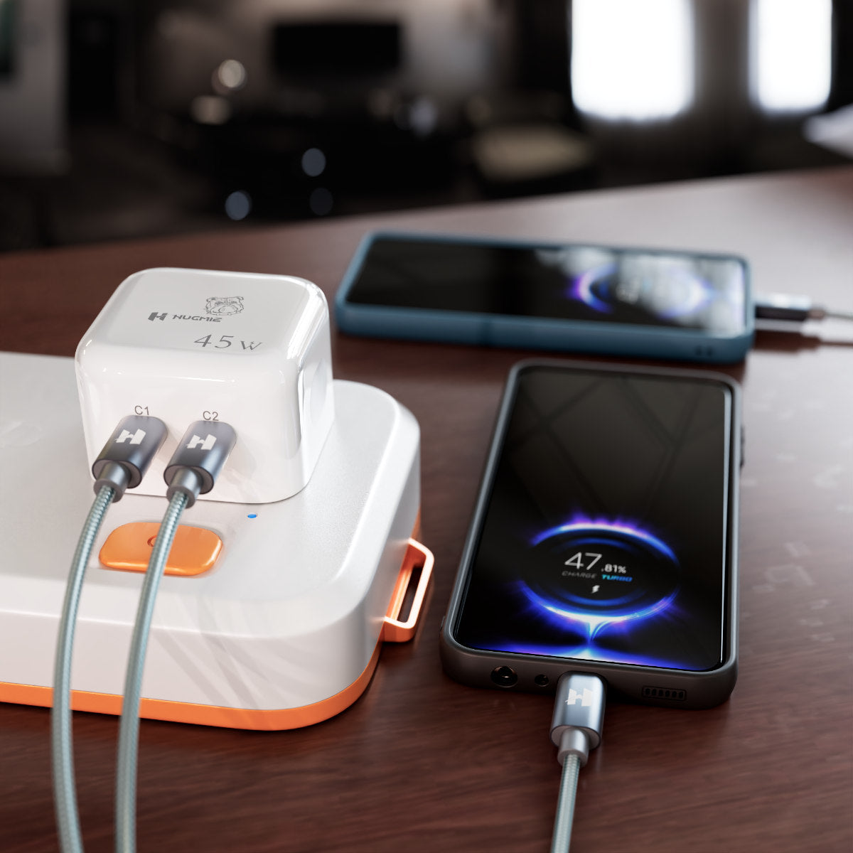Hugmie PD 45W Fast Charger in action, charging two smartphones simultaneously. High-speed power delivery for efficient charging.