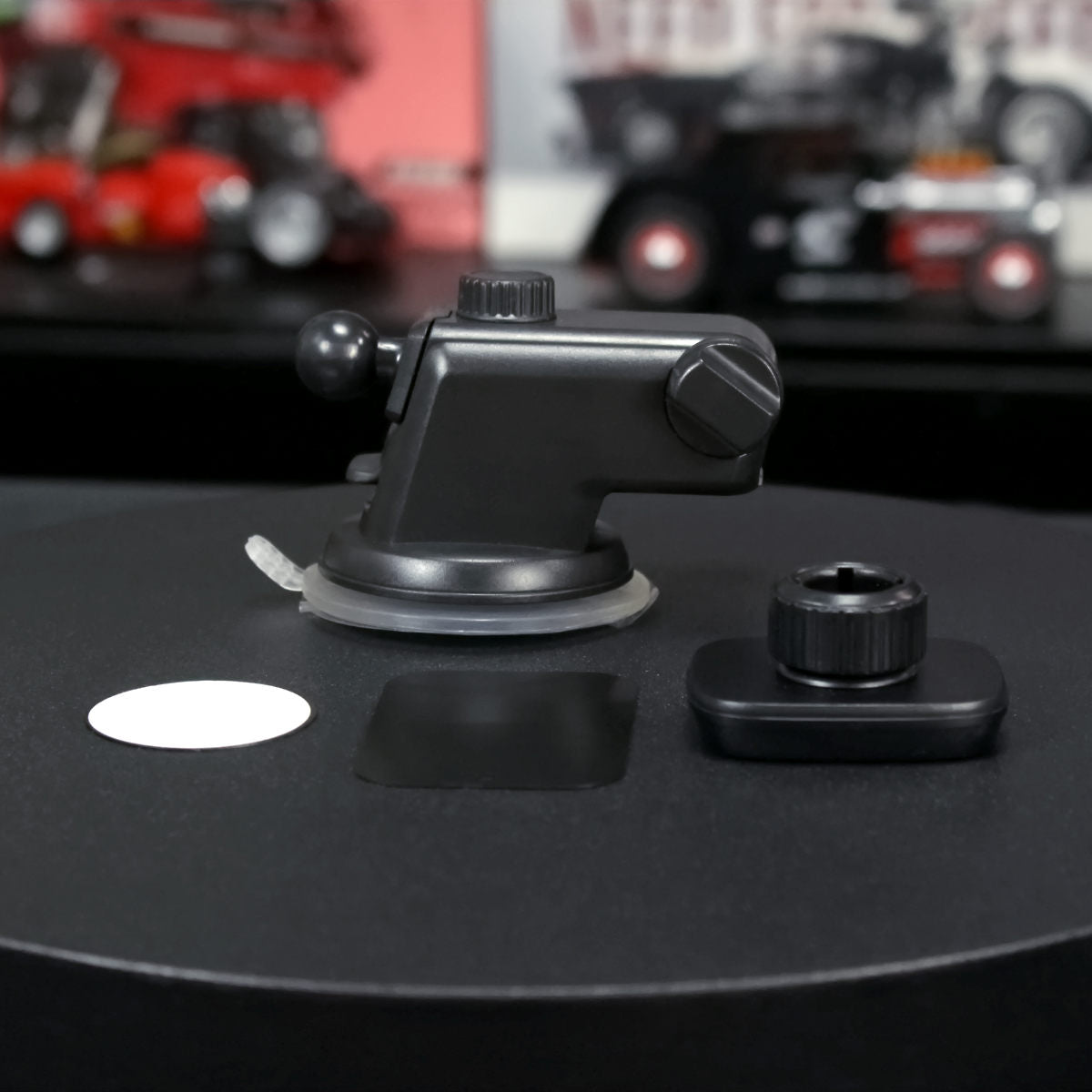 Disassembled UN-22 Magnetic Car Phone Holder with included accessories for easy setup and installation.