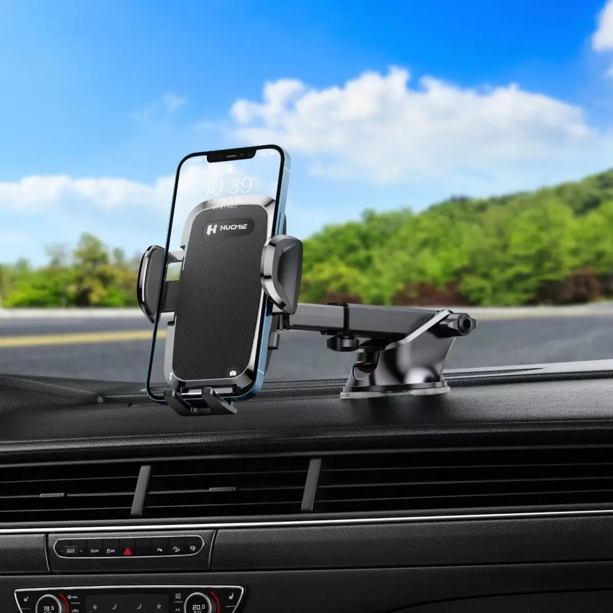 HUGMIE ZS-285 Car Phone Holder mounted on car dashboard holding smartphone, perfect for hands-free navigation and calls.