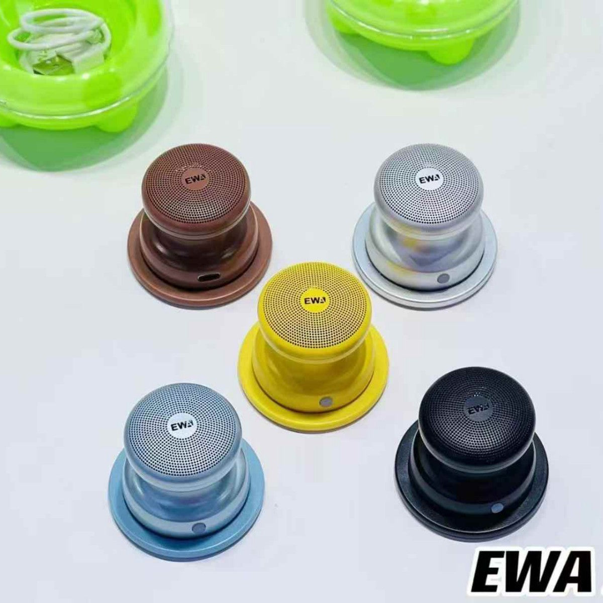 Five color variants of the EWA A117 Portable Mini Bluetooth Speaker displayed on a white surface, ideal for portable audio use.