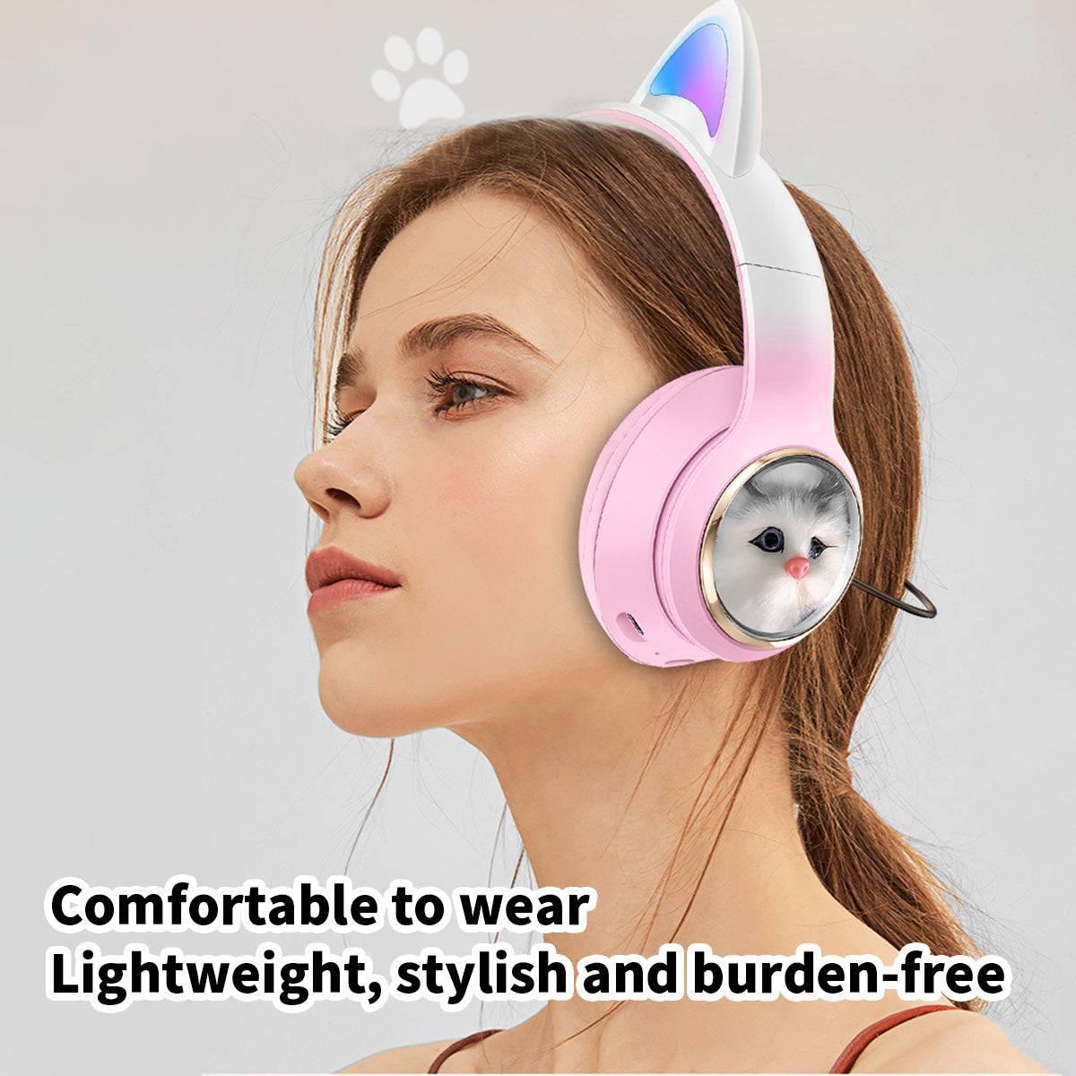 A woman wearing AKZ-09 Cat Ear Wireless Headphones in pink, showcasing their lightweight, stylish, and comfortable design.