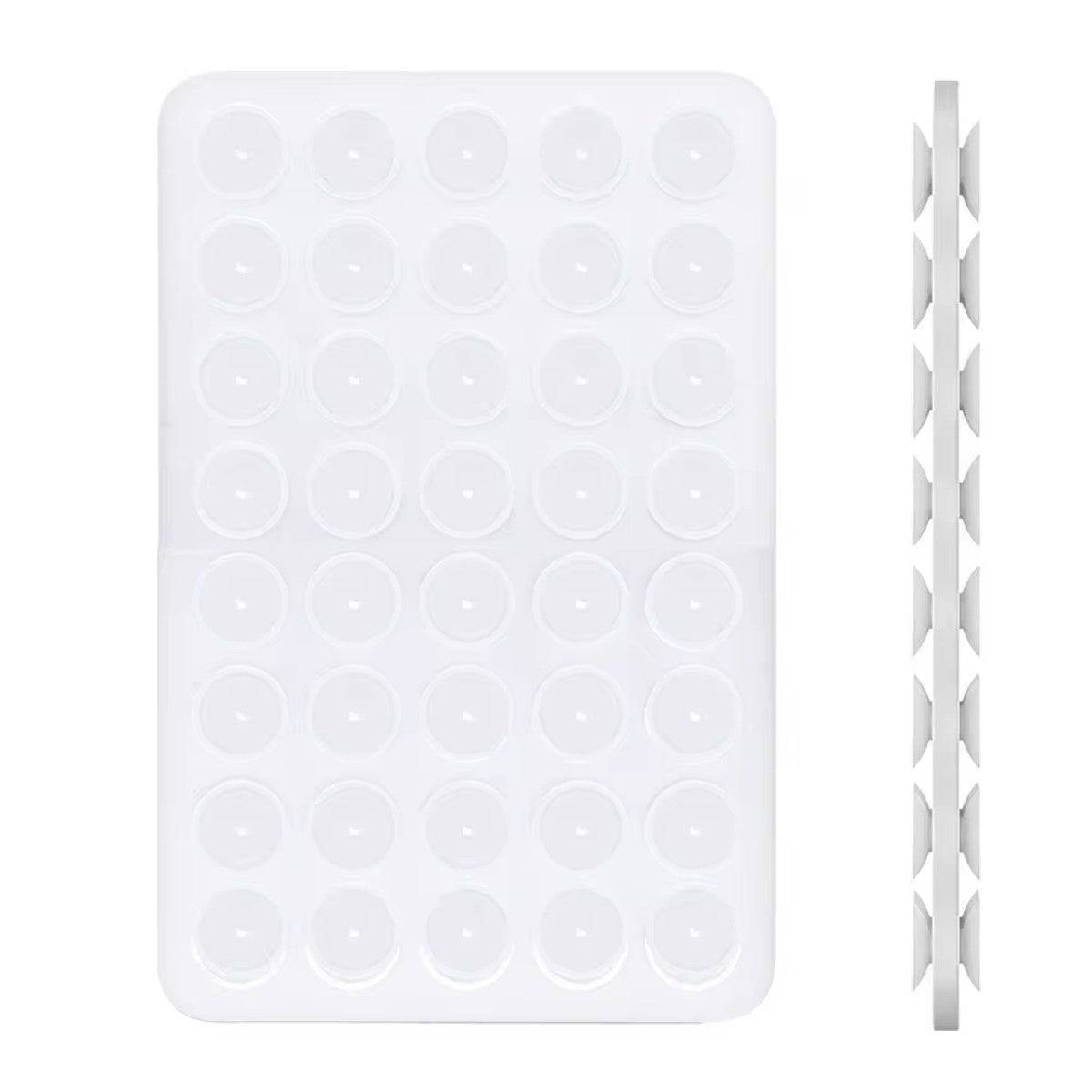 Transparent white silicone suction cup phone holder with side view, showcasing its double-sided suction cup design.