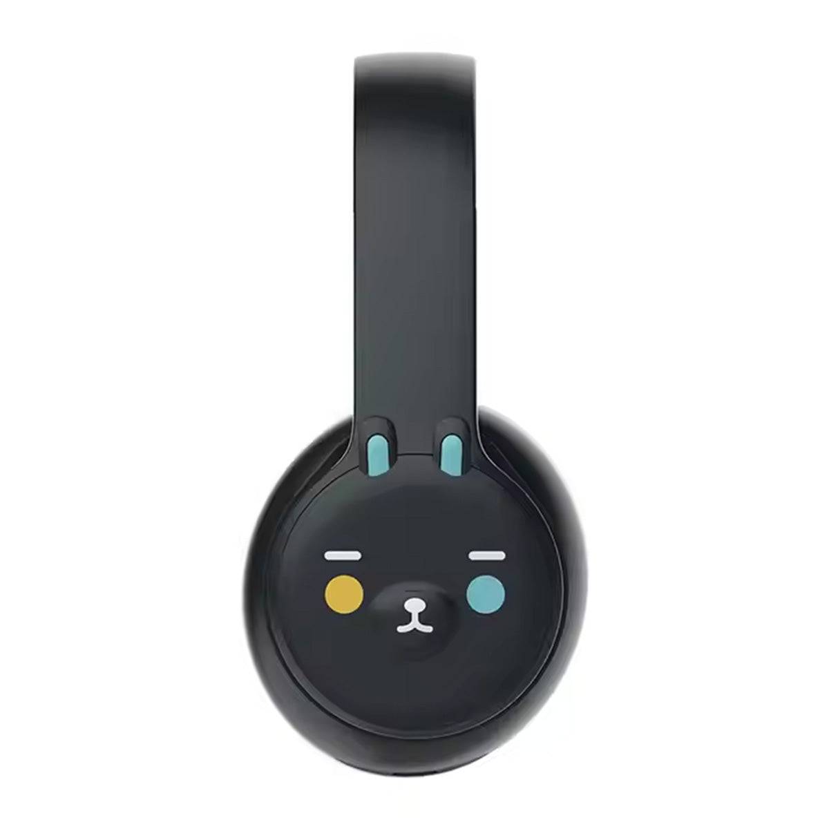 Side view of DOQAUS DU1 Bluetooth Kids Headphones in black, featuring a cute animal face design with colorful accents on the ear cup.