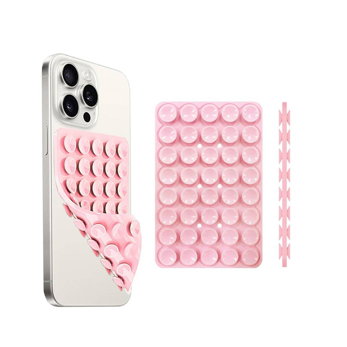 Double-sided silicone suction cup phone holder in pink attached to the back of a smartphone. Ideal for hands-free use on smooth surfaces.