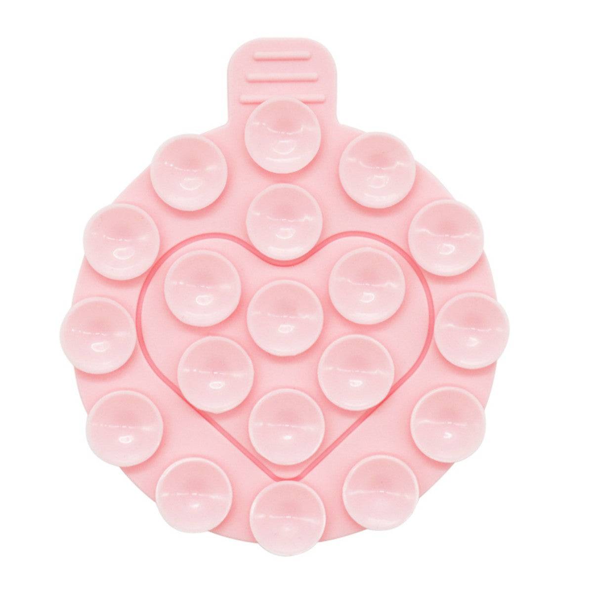 Light pink heart-shaped silicone suction cup phone holder with strong adhesion for hands-free phone use on smooth surfaces.
