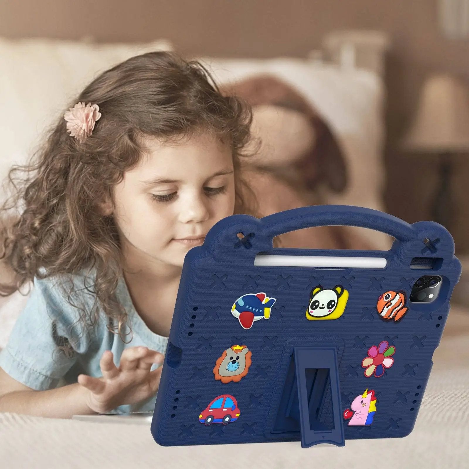 Child using a Blue Handle Kids iPad Pro Protective Case, designed for safety, durability, and easy handling with a built-in stand.