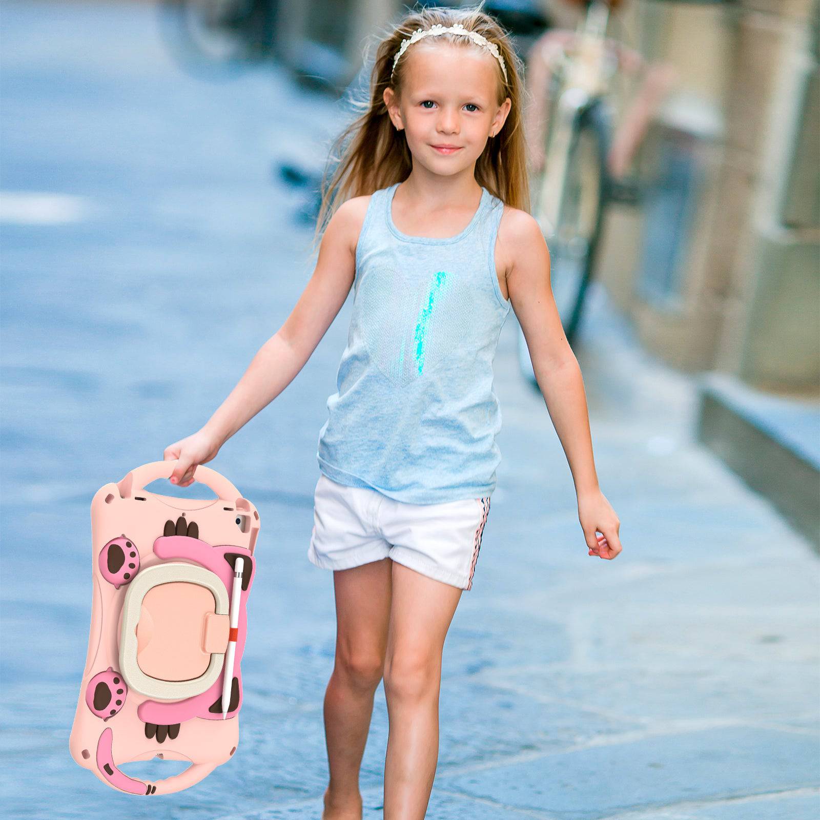 Girl carrying the Kitten Kids iPad Protective Case with ergonomic handle. Shockproof EVA rubber case for iPad 7th/8th/9th Gen, iPad Air 3, and 10.5 inch iPad Pro.