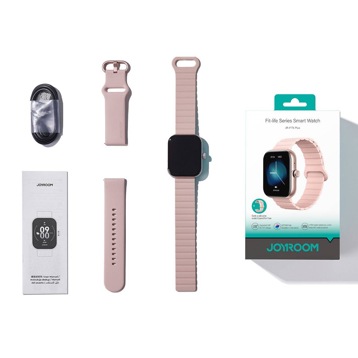 Unboxing of the JOYROOM JR-FT5 Plus Smart Watch, including the smartwatch, extra silicone strap, charging cable, and user manual.