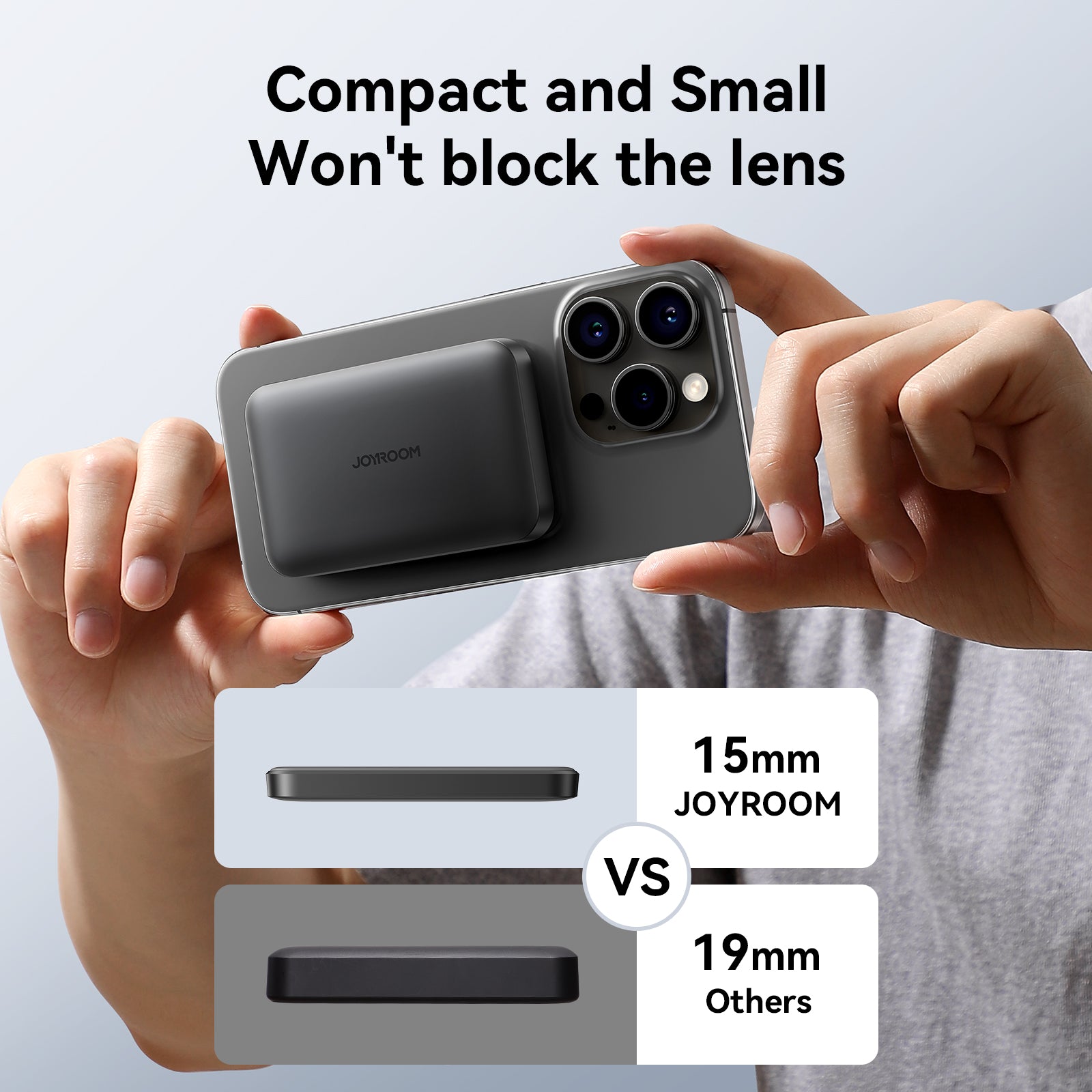 Compact JOYROOM JR-W020 5000mAh power bank shown not blocking iPhone camera lens, compared to thicker alternatives.