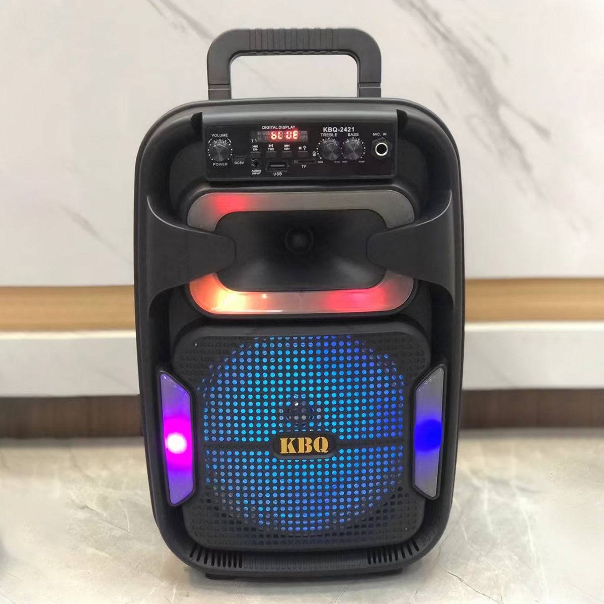 KBQ-2421 Outdoor Bluetooth Karaoke Speaker with Mic illuminated with blue and red LED lights, delivering high-quality sound and portable entertainment.