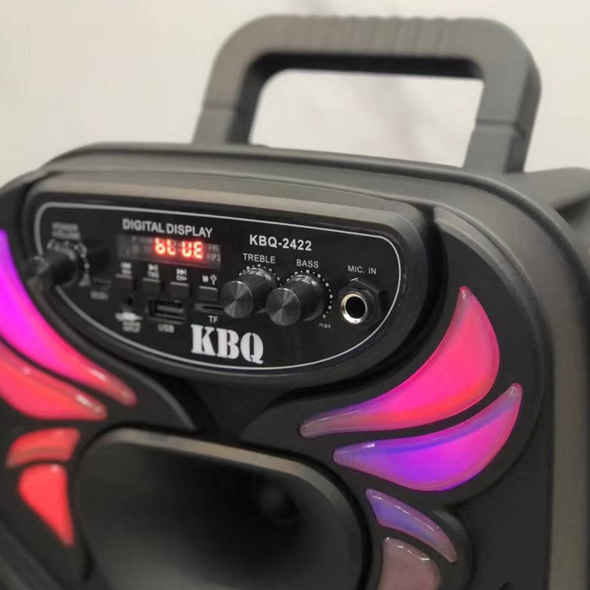 Close-up of KBQ-2422 Bluetooth Karaoke Speaker's control panel featuring treble, bass, mic input, and digital display.