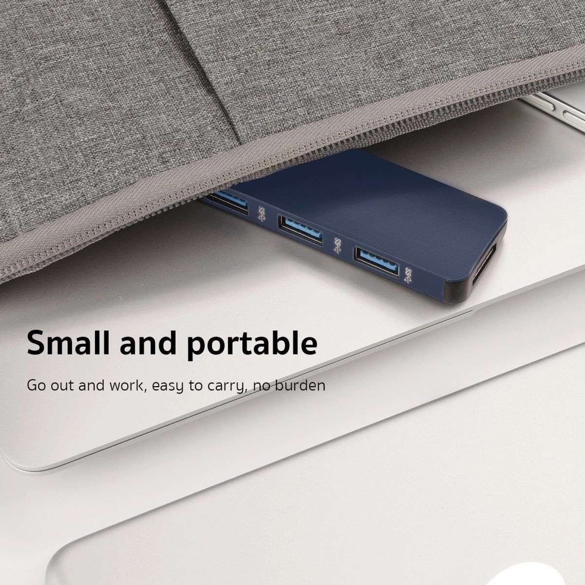 Compact and portable COTECi MB1084 Type-C Hub Adapter, designed for easy carrying and convenience in mobile work setups.