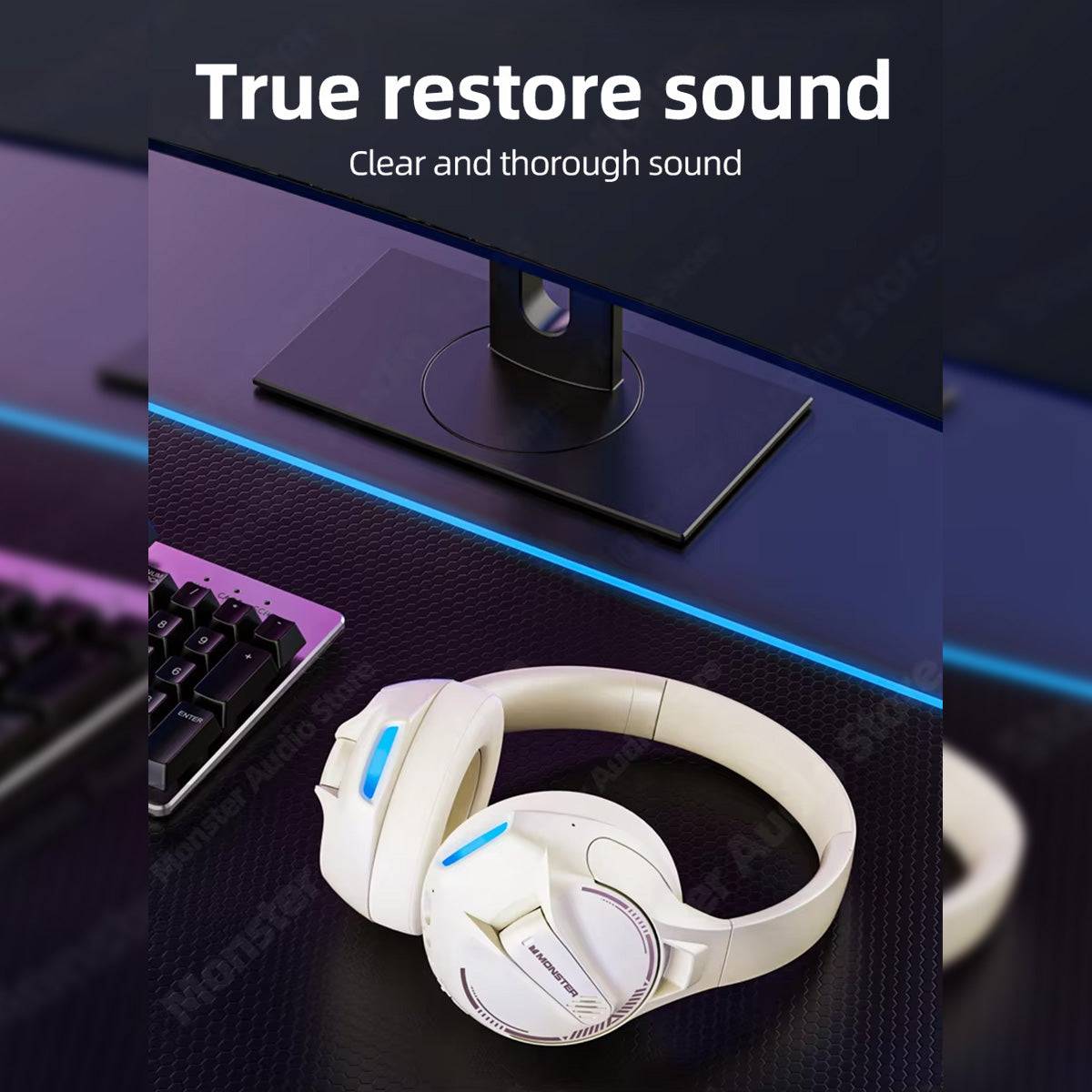 White MONSTER XKH03 ANC Bluetooth Wireless Headphones placed on a desk, emphasizing true sound restoration and clear, high-quality audio output.