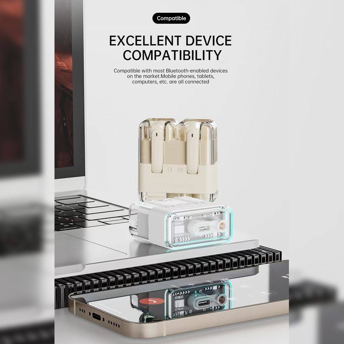 MONSTER XKT12 earphones displayed with a laptop and smartphone, emphasizing excellent Bluetooth device compatibility.