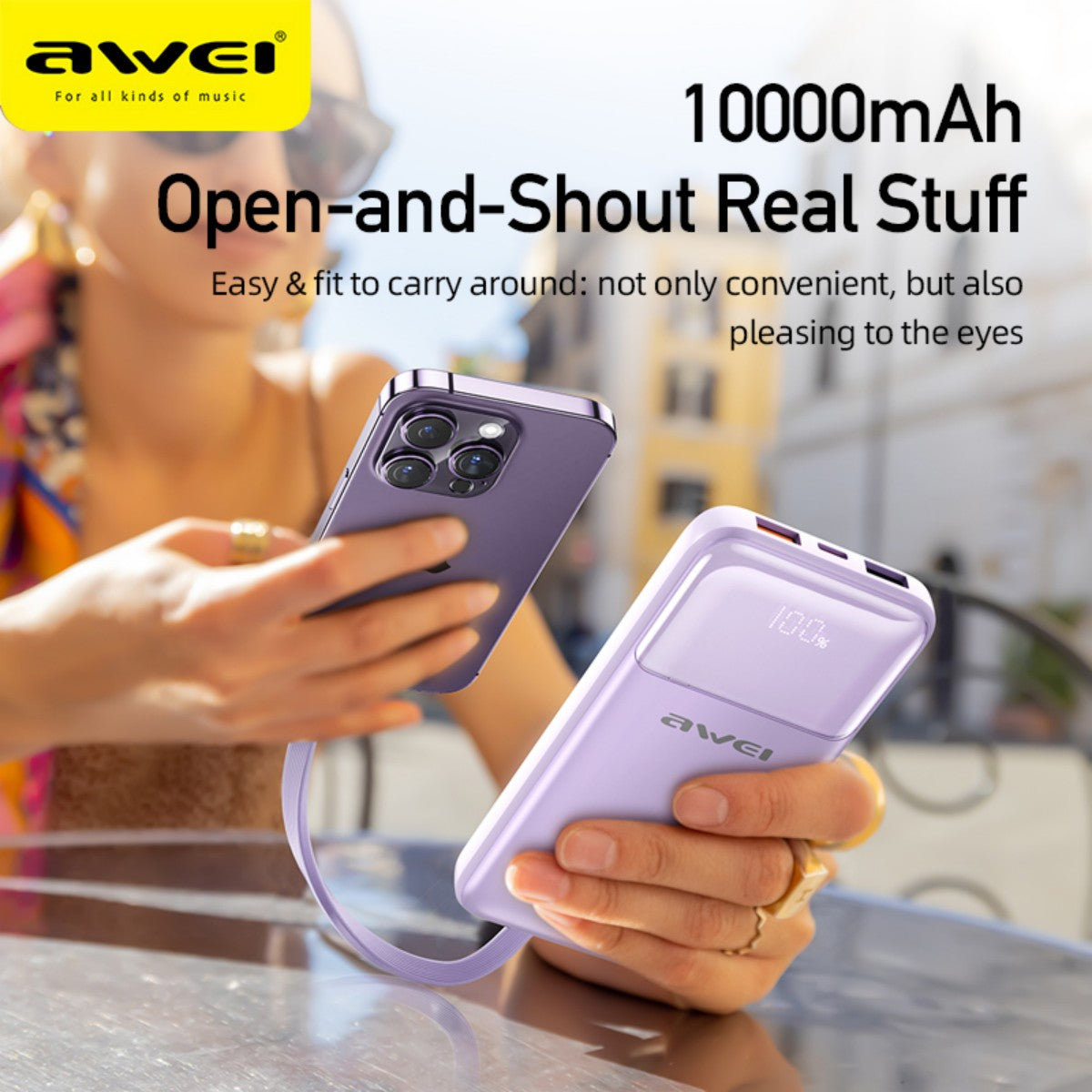 User holding AWEI P106K 10000mAh power bank in purple, demonstrating its compact, stylish design and real-time battery display.