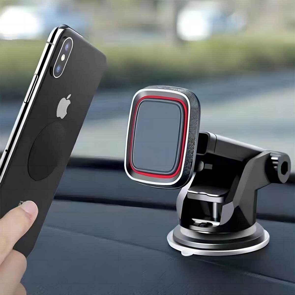 Magnetic car phone holder on a dashboard with a user placing a smartphone onto the mount.