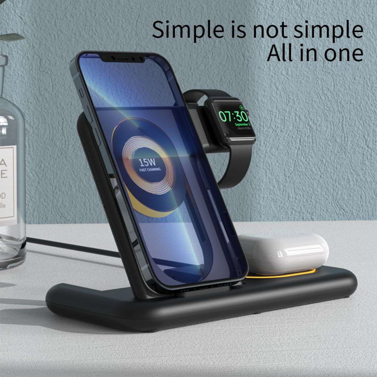 Minimalist all-in-one design of the Y36 6 in 1 15W Folding Wireless Charger in black, charging a smartphone, smartwatch, and earbuds.
